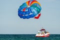 Sunny Beach, Bulgaria July 13, 2019. A motorboat pulls a parachute with two tourists on the Black Sea off the coast of Sunny Beach