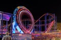 SUNNY BEACH, BULGARIA - September 10, 2017: Attraction in the park. Roller coaster in motion at night. A long exposure photo Royalty Free Stock Photo