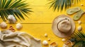 Sunny Beach Day: Yellow Wooden Plank with Beach Accessories - Hat, Towel, Flip Flops, Seashells, and Palm Leaves Royalty Free Stock Photo