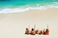 Happy family relaxing on white sand sea beach Royalty Free Stock Photo