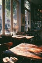 Sunny Cafe Interior with Rustic Wooden Tables Royalty Free Stock Photo