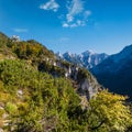 Sunny colorful autumn alpine scene. Peaceful rocky mountain view from hiking path near Almsee lake, Upper Austria Royalty Free Stock Photo