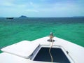 Sunny day at anchor fishing boat in sea, Thailand
