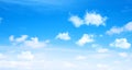 Sunny day background, blue sky with white cumulus clouds