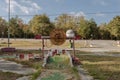 Sunny day behind strange feature left forgotten at an abandoned miniature golf course