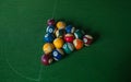 Billiards balls on green table, game in summer day