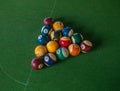 Billiards balls on green table, game in summer day