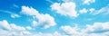 Sunny day with blue sky and fluffy white clouds perfect background for designs and presentations