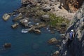 Sunny day of climbing on stone cliffs in Portugal with climbers