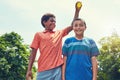 Sunny day fun. adorable boys playing with water balloons outdoors. Royalty Free Stock Photo