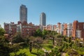 Sunny day in green european courtyard. Modern residential complex in Barcelona, Spain