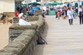 Elderly Sikh gentleman people watching, chilling, sat on a bench at Weston seafront.