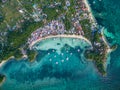 Sunny Day in Malapascua Island in Visayan Sea, One of Cebu Island. Sea water and Boats. Bounty Beach with Local Architecture Royalty Free Stock Photo