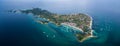 Sunny Day in Malapascua Island in Visayan Sea, One of Cebu Island. Sea water and Boats. Bounty Beach with Local Architecture Royalty Free Stock Photo