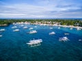 Sunny Day in Malapascua Island in Visayan Sea, One of Cebu Island. Sea water and Boats. Bounty Beach Royalty Free Stock Photo