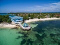 Sunny Day in Malapascua Island in Visayan Sea, One of Cebu Island. Sea water and Boats. Bounty Beach with Local Architecture Royalty Free Stock Photo