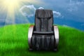 Sunny day with massage arm-chair Royalty Free Stock Photo