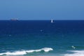 Tanker and sailboat sailing off Point Cartwright