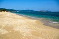 Sunny day, sand creaking, clear turquoise sea, coral reefs on the coast of Yalong Bay in South China Sea. Sanya, island Hainan, Royalty Free Stock Photo