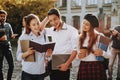 Sunny Day. Students. Two Girls and Boy. Together Royalty Free Stock Photo
