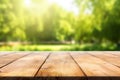 On a sunny day in the summer season, a wooden table stands against the backdrop of blurry trees in a park. Generative AI