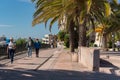 Sunny day in Tarragona, People in Passeig de les Palmeres in Spain - A UNESCO World Heritage Site in summer