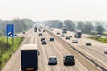 Sunny day view of UK motorway traffic