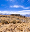 Sunny day walking through the mountains of peru seeing curious rock formations Royalty Free Stock Photo