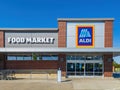 Sunny exterior view of the Aldi market