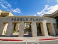 Sunny exterior view of the Pebble Place