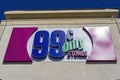 Sunny exterior view of the sign of 99 Cents Only Stores