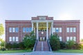 Sunny exterior view of the Walker Hall of University of the Ozarks