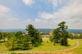 Sunny exterior view of the War Memorial building of Cornell University