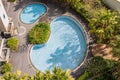 Sunny high angle view of a modern swimming pool