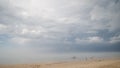 Sunny, hot summer day, but cold water. Fog on the beach, Pavilosta, Latvia