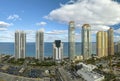 Sunny Isles Beach city with luxurious highrise hotels and condo buildings on Atlantic ocean shore. American tourism