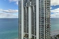 Sunny Isles Beach city with luxurious highrise hotels and condo buildings on Atlantic ocean shore. American tourism Royalty Free Stock Photo