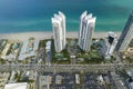 Sunny Isles Beach city with luxurious highrise hotels and condo buildings and busy ocean drive on Atlantic coast Royalty Free Stock Photo