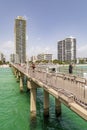 people at pier on Jade beach