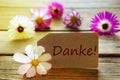 Sunny Label With German Text Danke With Cosmea Blossoms