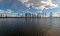 Sunny landscape with lake, cloud glare in water