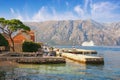 Sunny Mediterranean landscape. Montenegro, Adriatic Sea, Bay of Kotor. View of Prcanj town