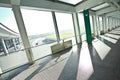 Sunny on modern glass office windows building interior corridor Royalty Free Stock Photo