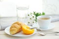 Sunny morning with Breakfast, coffee, croissant Royalty Free Stock Photo