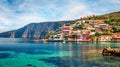 Sunny morning cityscape of Asos village on the west coast of the island of Cephalonia, Greece, Europe. Colorful spring sescape of