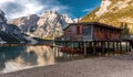 Sunny morning at Famouse Mountain Lake in dolomites Alps. Wonderful Braies Lake during sunrise. Amazing Summer Mountain Landscape Royalty Free Stock Photo