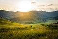 Sunny morning in mountain. Sunset over the mountains. Summer landscape in the mountains. Serpentine mountain road. Beautiful Royalty Free Stock Photo