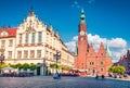 Sunny morning scene on Wroclaw Market Square with Town Hall. Splendid cityscape of historical capital of Silesia, Poland, Europe.