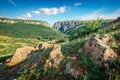 Sunny morning view of Cheile Turzii / Turzii`s Gorge canyon, large natural reserve with marked trails for scenic gorge hikes cross Royalty Free Stock Photo