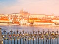 Sunny morning view of Prague Castle in Hradcany, Prague, Czech Republic. Padlocks hanging on the railings in the Royalty Free Stock Photo